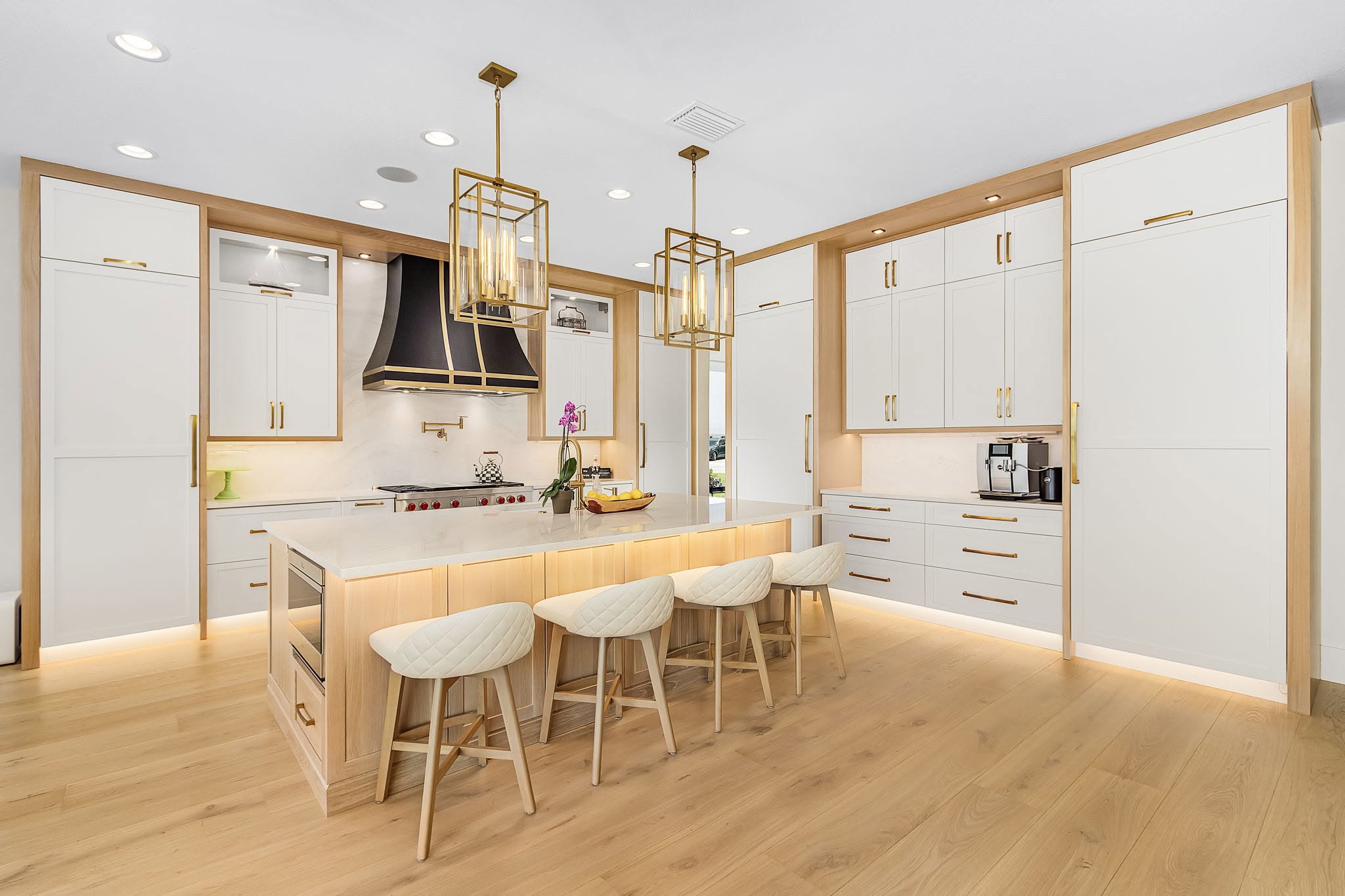 Completed kitchen renovation with an improved central gathering area by Proskillz Remodeling