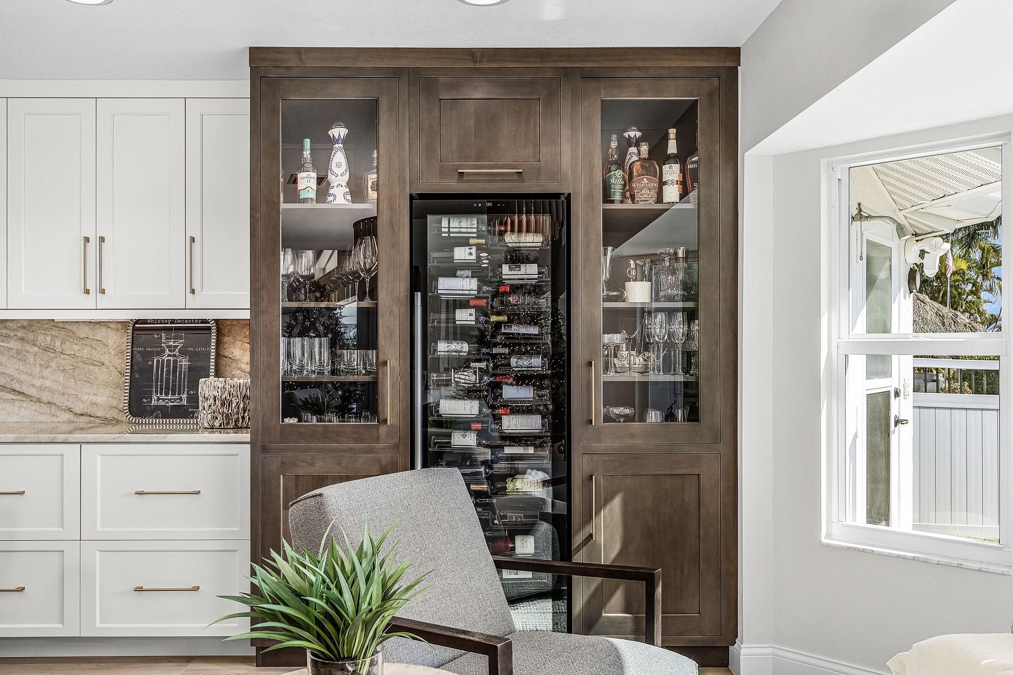 Integrated storage and finish work within a complete kitchen renovation by Proskillz Remodeling